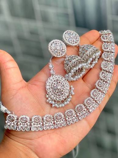 Silver imitation jewellery set with necklace and jhumka earrings